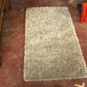 This is a gray fluffy rug